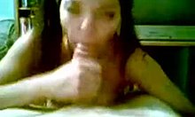 Petite Asian in pigtails sucks on a monster white cock